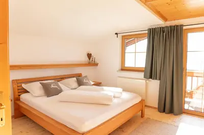 Ein Bett oder Betten in einem Zimmer der Unterkunft Apartment Egidi