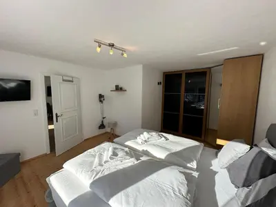 Ein Bett oder Betten in einem Zimmer der Unterkunft Ferienwohnung Kaiserblick