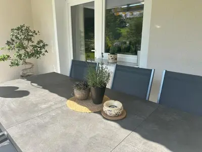 Ein Sitzbereich in der Unterkunft Ferienwohnung Kaiserblick