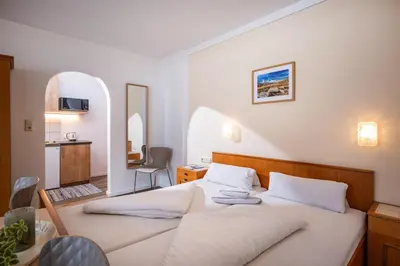 Ein Bett oder Betten in einem Zimmer der Unterkunft Gästehaus Wildauer