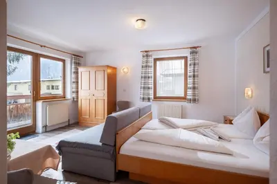 Ein Bett oder Betten in einem Zimmer der Unterkunft Gästehaus Wildauer