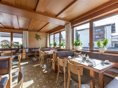 Ein Restaurant oder anderes Speiselokal in der Unterkunft Gästehaus Wildauer