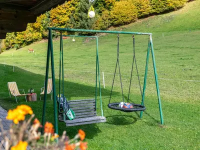 Ein Garten an der Unterkunft Tiroler Bergtraum Top 1
