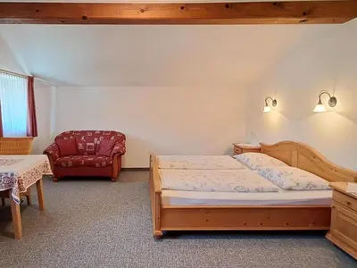 Ein Bett oder Betten in einem Zimmer der Unterkunft Foidlhof - Privatzimmer