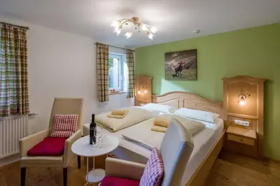Ein Bett oder Betten in einem Zimmer der Unterkunft Alpenresidenz Fieberbrunn