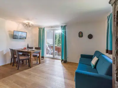 Ein Sitzbereich in der Unterkunft Alpenresidenz Fieberbrunn