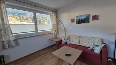 Ein Sitzbereich in der Unterkunft Appartement Kaufmann