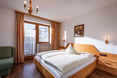 Ein Bett oder Betten in einem Zimmer der Unterkunft Pension Obermoser