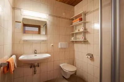 Ein Badezimmer in der Unterkunft Pension Obermoser