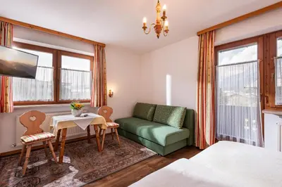 Ein Bett oder Betten in einem Zimmer der Unterkunft Pension Obermoser