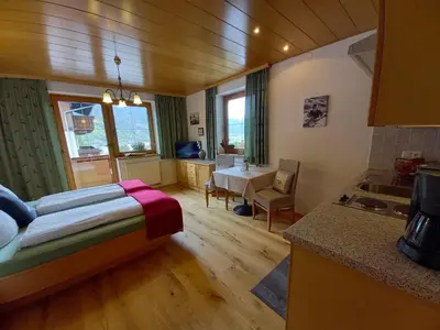 Ein Bett oder Betten in einem Zimmer der Unterkunft Ferienwohnung Landhaus Lechner