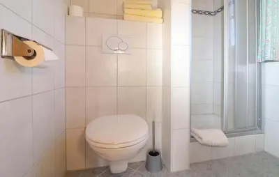 Ein Badezimmer in der Unterkunft Ferienwohnung Brixen Im Thale