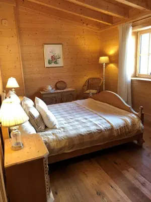 Ein Bett oder Betten in einem Zimmer der Unterkunft The Lodge