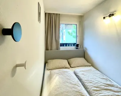 Ein Bett oder Betten in einem Zimmer der Unterkunft An der Gondel - Haus Thalgau