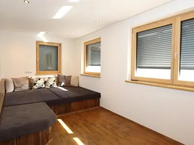 Ein Sitzbereich in der Unterkunft Stoanerhof