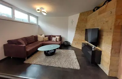 Ein Sitzbereich in der Unterkunft Ferienwohnung Haag