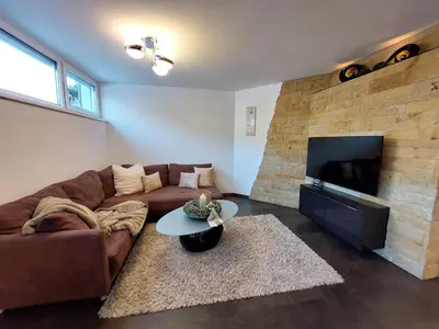 Ein Sitzbereich in der Unterkunft Ferienwohnung Haag
