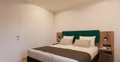 Ein Bett oder Betten in einem Zimmer der Unterkunft Apartments by Simmerlwirt