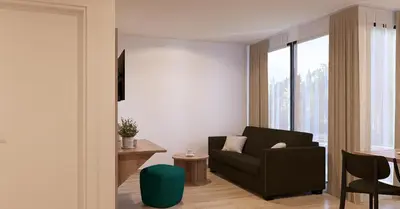 Ein Sitzbereich in der Unterkunft Apartments by Simmerlwirt