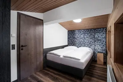 Ein Bett oder Betten in einem Zimmer der Unterkunft FIVE SEASONS - Hideaway Saalbach