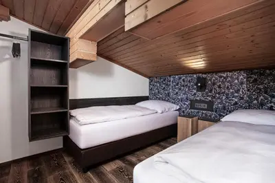 Ein Bett oder Betten in einem Zimmer der Unterkunft FIVE SEASONS - Hideaway Saalbach