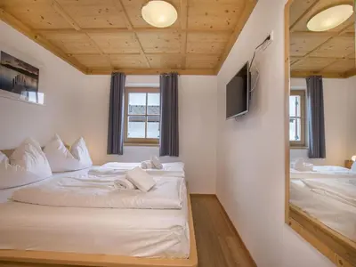 Ein Bett oder Betten in einem Zimmer der Unterkunft Chalet in Königsleiten near Zillertal Ski Area