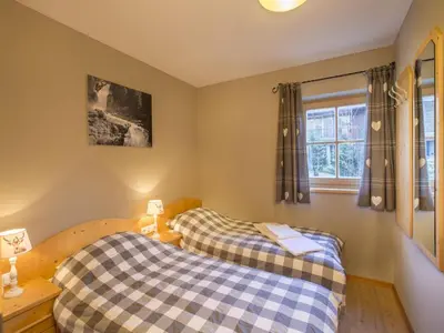 Ein Bett oder Betten in einem Zimmer der Unterkunft Chalet in Königsleiten near Ski Lift