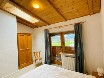 Ein Bett oder Betten in einem Zimmer der Unterkunft Haus Alpenfriede