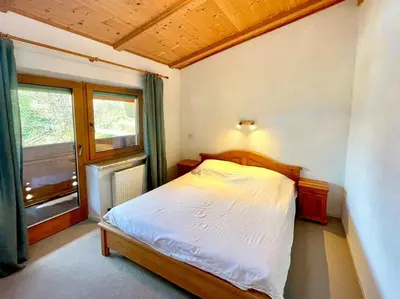 Ein Bett oder Betten in einem Zimmer der Unterkunft Haus Alpenfriede