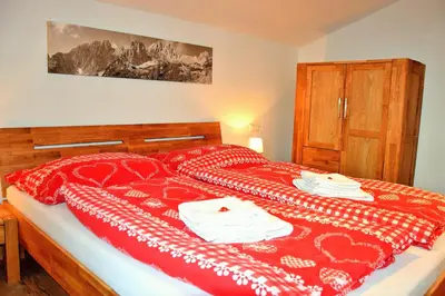 Ein Bett oder Betten in einem Zimmer der Unterkunft Tennladen Apartments