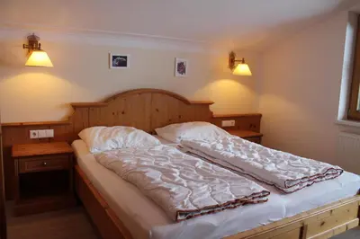 Ein Bett oder Betten in einem Zimmer der Unterkunft Appartements Innerache