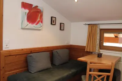 Ein Sitzbereich in der Unterkunft Appartements Innerache