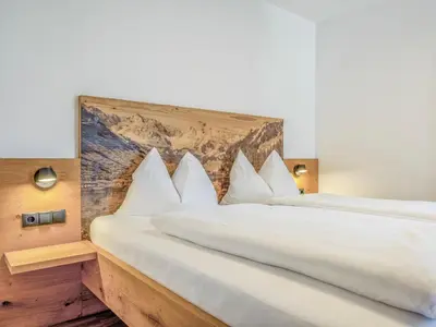 Ein Bett oder Betten in einem Zimmer der Unterkunft Helfensteinblick