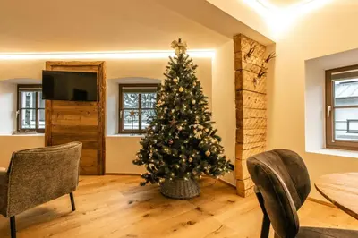 Ein Sitzbereich in der Unterkunft Appartements Gasthof Traube Top 4
