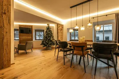 Ein Sitzbereich in der Unterkunft Appartements Gasthof Traube Top 4
