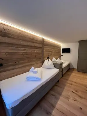 Ein Bett oder Betten in einem Zimmer der Unterkunft Appartements Gasthof Traube Top 4