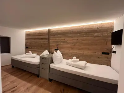 Ein Bett oder Betten in einem Zimmer der Unterkunft Appartements Gasthof Traube Top 4