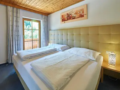 Ein Bett oder Betten in einem Zimmer der Unterkunft Chalet Felix by we rent, JOKERCARD INCLUDED