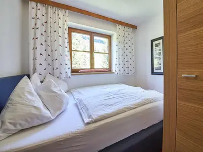 Ein Bett oder Betten in einem Zimmer der Unterkunft Chalet Felix by we rent, JOKERCARD INCLUDED