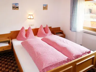 Ein Bett oder Betten in einem Zimmer der Unterkunft Apartment Fichtenblick-4 by Interhome