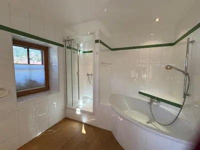 Ein Badezimmer in der Unterkunft ALPIN CHARME APARTMENTS Jucheee Boutique ChaletSuite