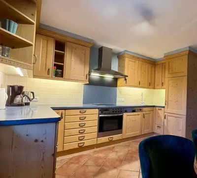 Küche/Küchenzeile in der Unterkunft ALPIN CHARME APARTMENTS Jucheee Boutique ChaletSuite