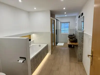 Ein Badezimmer in der Unterkunft Alpenlodge, Ferienwohnung 16