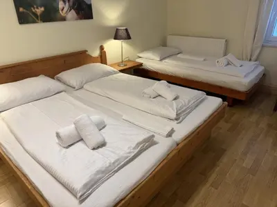 Ein Bett oder Betten in einem Zimmer der Unterkunft Alpenlodge, Ferienwohnung 16