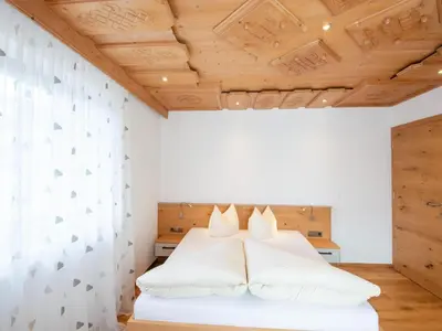 Ein Bett oder Betten in einem Zimmer der Unterkunft Chalet in Zillertal near Ski Bus Stop