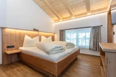 Ein Bett oder Betten in einem Zimmer der Unterkunft Ferienwohnungen Recherhof