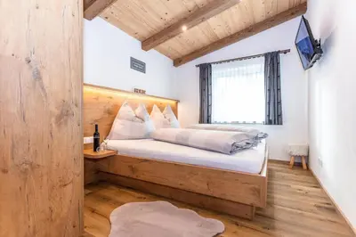 Ein Bett oder Betten in einem Zimmer der Unterkunft Ferienwohnungen Recherhof