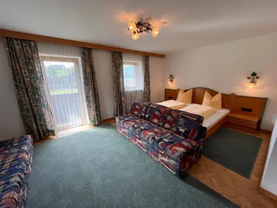 Ein Bett oder Betten in einem Zimmer der Unterkunft Pension Haidachhof