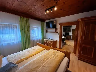 Ein Bett oder Betten in einem Zimmer der Unterkunft Pension Haidachhof
