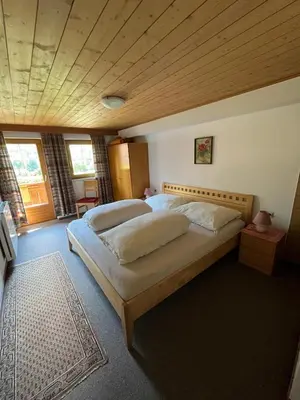 Ein Bett oder Betten in einem Zimmer der Unterkunft Schmidhof